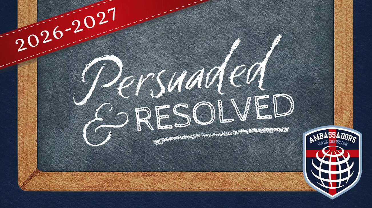 Chalk board with the text "Persuaded & Resolved" written on it.